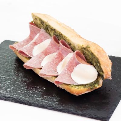Salami, pesto, and mozzarella sandwich.