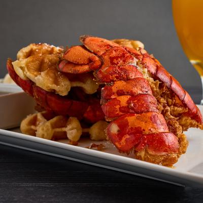 Lobster tail and waffles.
