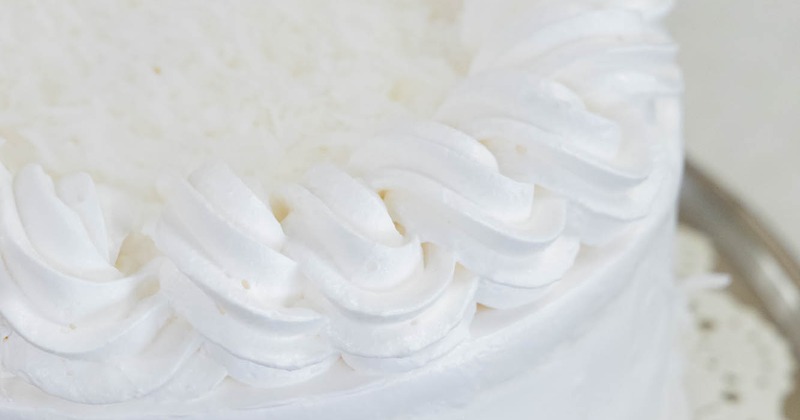 Close up of a white coconut cake