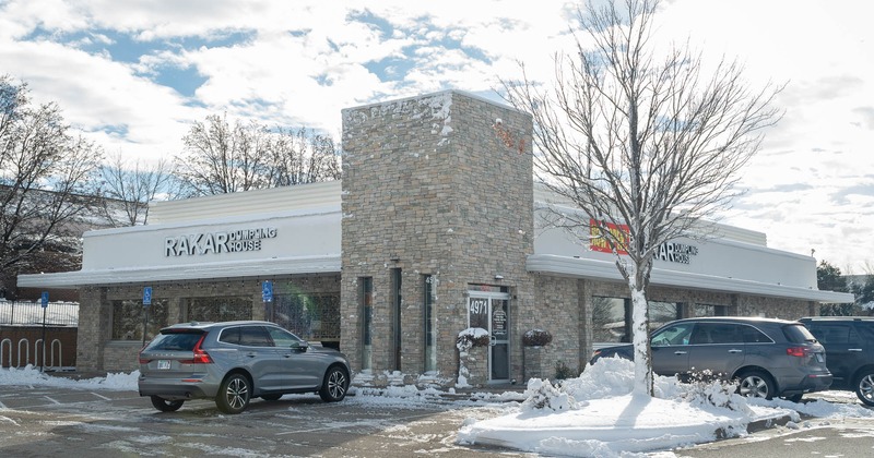 Exterior, front view to restaurant, parking lot