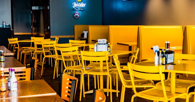 Interior, tables and chairs all lined up