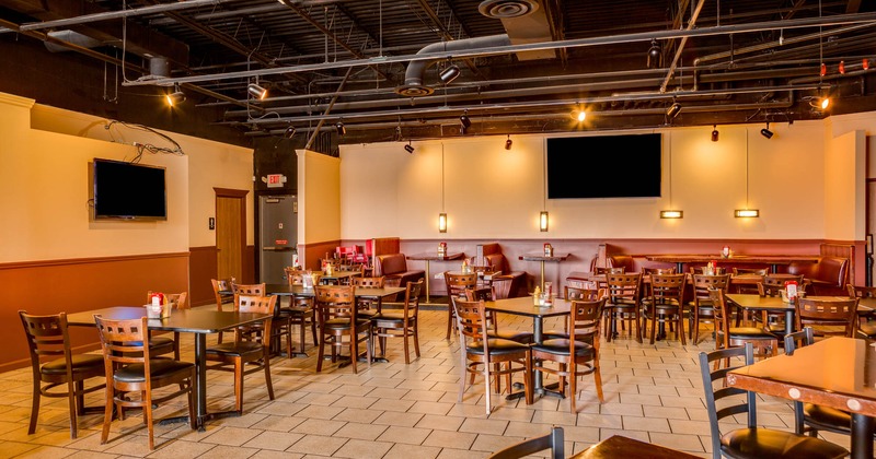 Interior, dining area, tables and chairs ready for guests