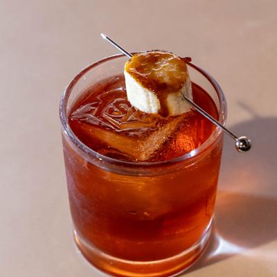 Bourbon, Vermouth and banana liqueur cocktail.