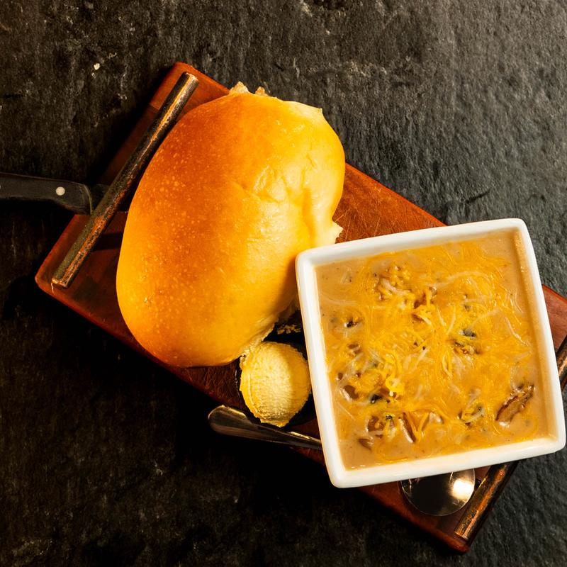 Homemade Prime Rib & Potato Soup Bowl with Bread photo
