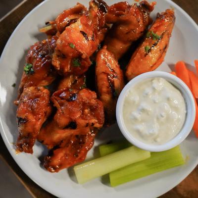 Wing Flight paired with creamy dip, carrots and celery.