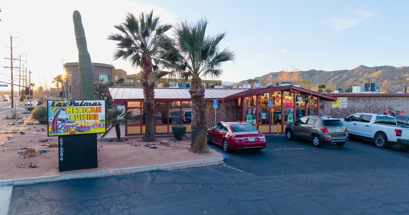 Exterior, front view to restaurant and parking lot