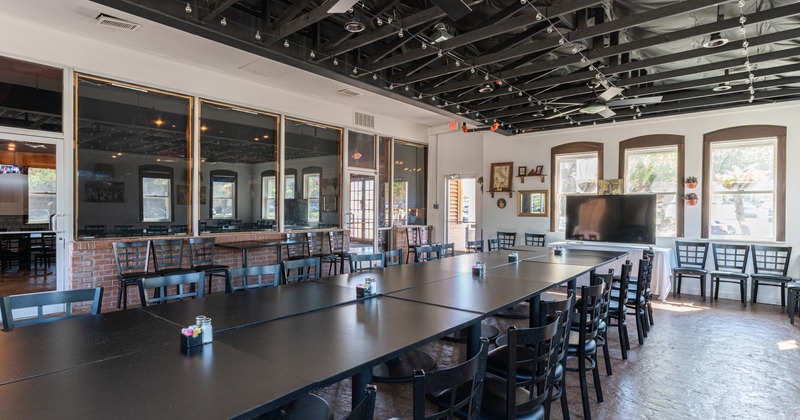 Interior, conjoined tables for a large group of guests
