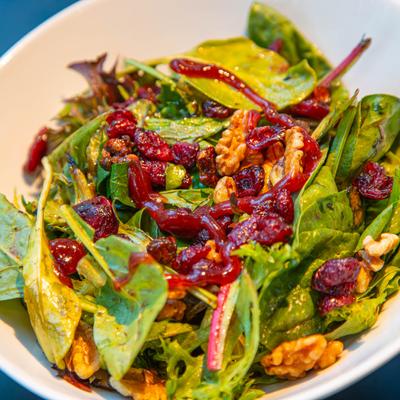 Salad, with cranberries, mixed greens, and candied walnuts.