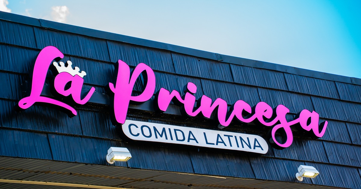 Exterior, light sign above entrance, close up