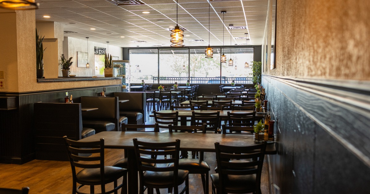 Interior, dining area with leather benches, tables and chairs