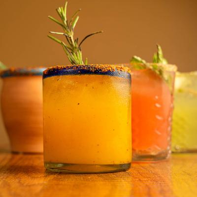 Multiple cocktail drinks.