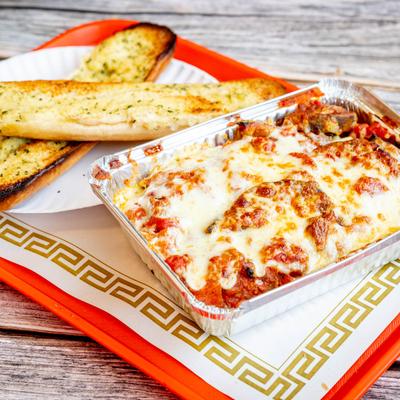 Spaghetti eggplant with garlic bread.