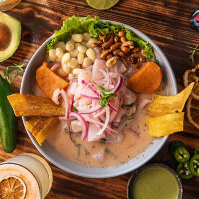 Peruvian fish ceviche with choclo corn, sweet potato, and crunchy plantain chips.