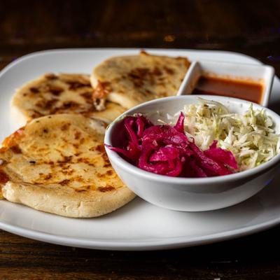 Stuffed  corn cakes  with salad and salsa.