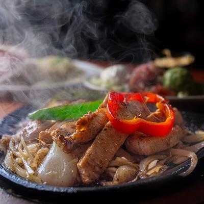 Sizzling chicken fajitas.