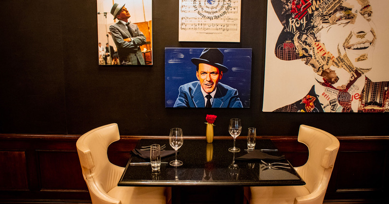 Table for two, wall pictures in the back