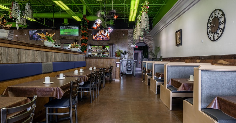 Interior, dining area with set tables ready for guests