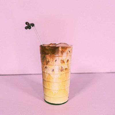 Iced latte in a tall glass.