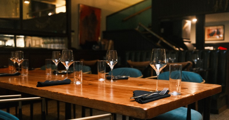 Dining table set for guests, close up