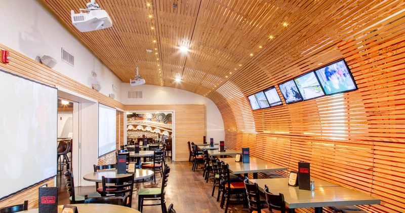 Interior, modern wood wall design with TVs, dining tables and chairs