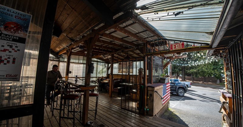 Interior, diner area, tables, chairs, people