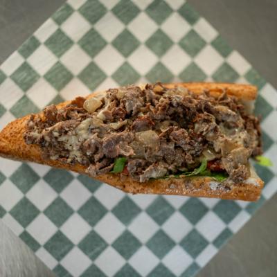 Baltimore cheesesteak sandwich with chopped beef.