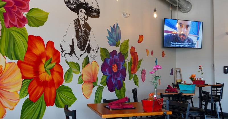 A part of the dining area, colorful wallpapers