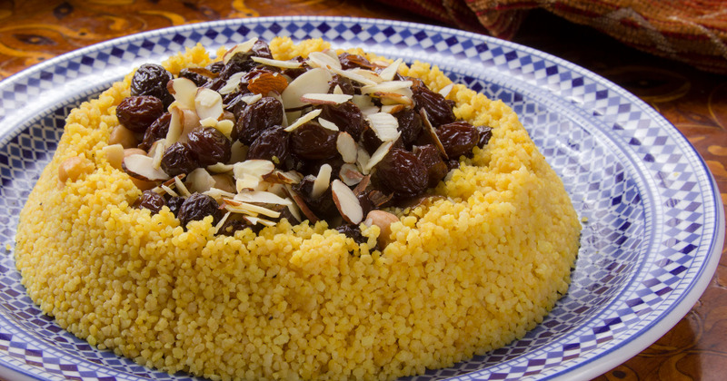 Cooked grain with nuts and dried fruit closeup