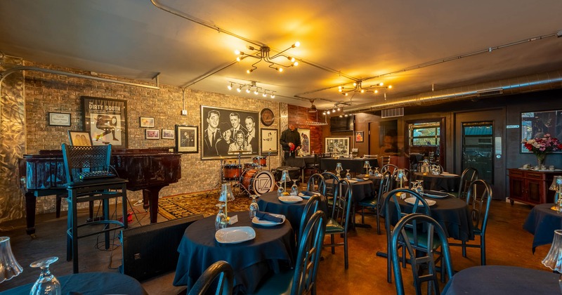 Interior, dining area with a stage in the back