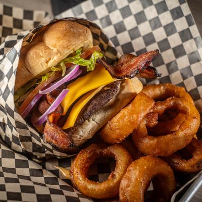 Double bacon cheeseburger with onion rings.