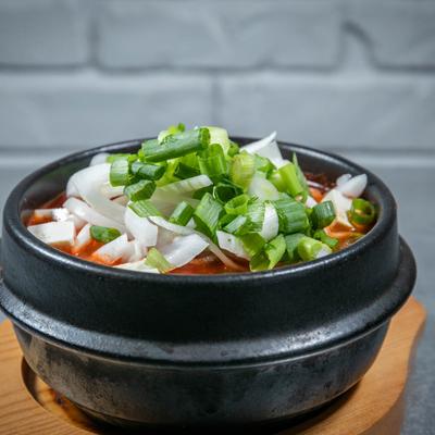 Kimchi and pork short rib, onions, and diced tofu.