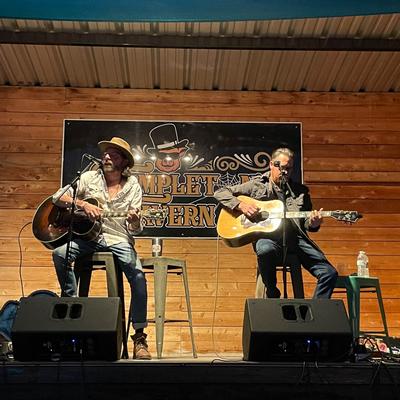 Guitar players performing.