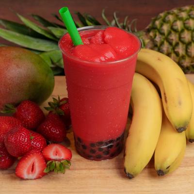 Lychee Dragon fruit smoothie  cup and various fresh fruits on the table.