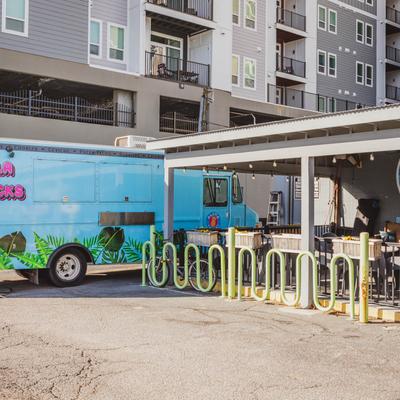 Exterior, Restaurant building, company's food truck.