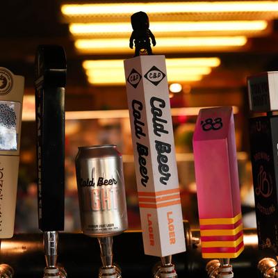 Beer taps with unique labels.