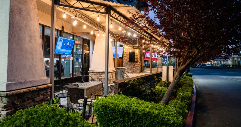 Exterior, patio with tables and chairs
