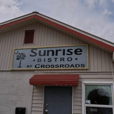 Restaurant sign above the front entrance.