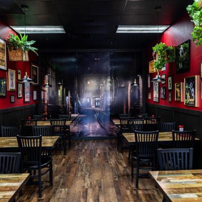 Interior, tables and chairs lined up.