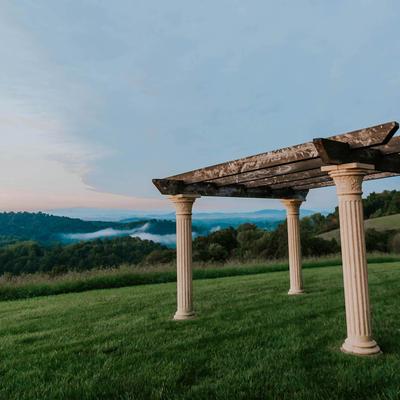 A large grass field and an altar.
