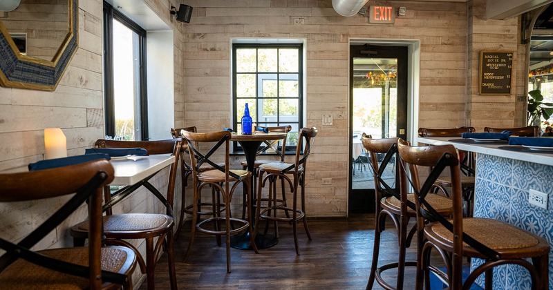 Interior, seating place with high tables and chairs