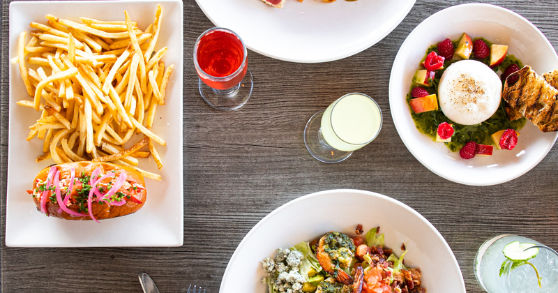 Variety of dishes and drinks served on a table