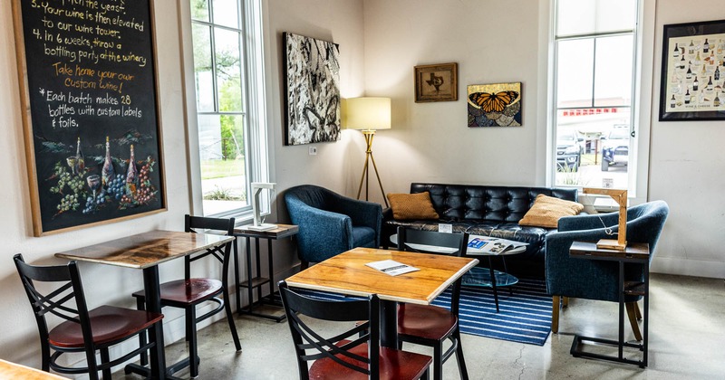 Interior, lounge area, corner seating, sofa with armchairs, regular tables for two