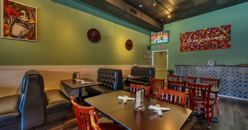 Cozy interior dining area with tables ready for guests