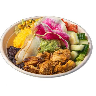 Chicken bowl with rice, beans, corn, fresh vegetables and a orchid garnish.