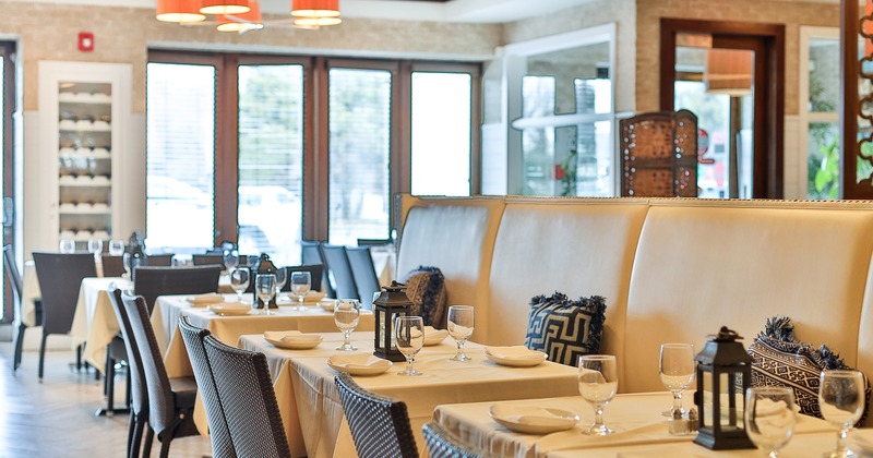 Restaurant interior, dining area with set tables