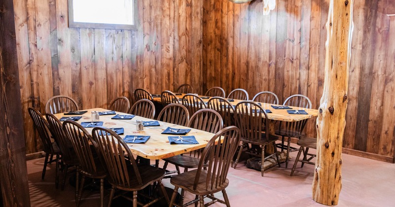 Interior, two tables ready for guests