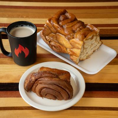 Caramel apple bread next to a plated slice and a coffee.