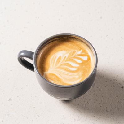 Latte with leaf latte art.