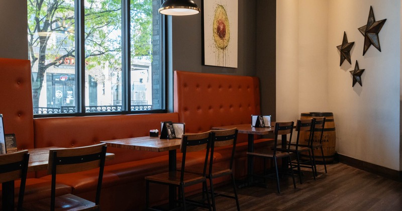 Inside, tufted long banquette seating, decoration