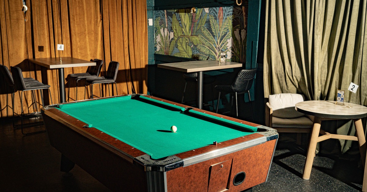 Interior, pool table in seating area